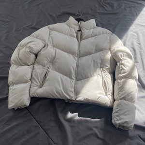 Puffer jacket in beige